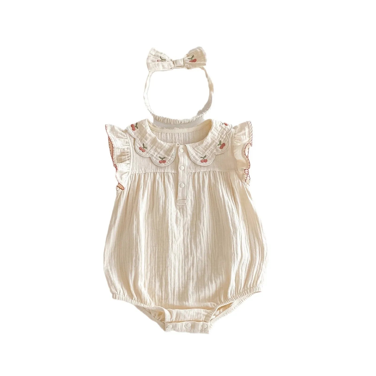 Apricot cotton double breasted sleeveless baby jumpsuit with matching hair band on white background