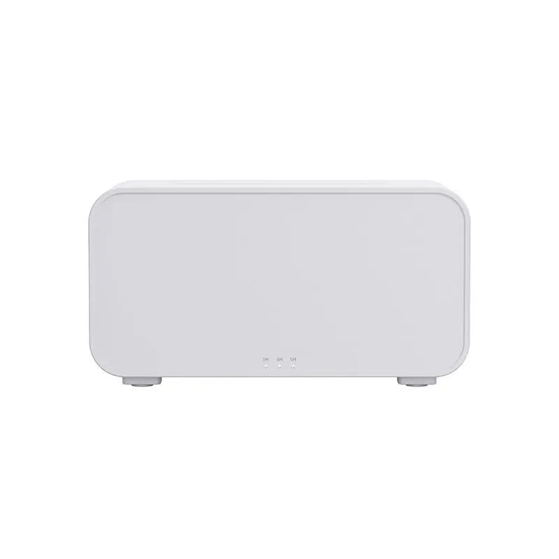 White USB aroma diffuser with simulated flame lighting effect on wooden surface