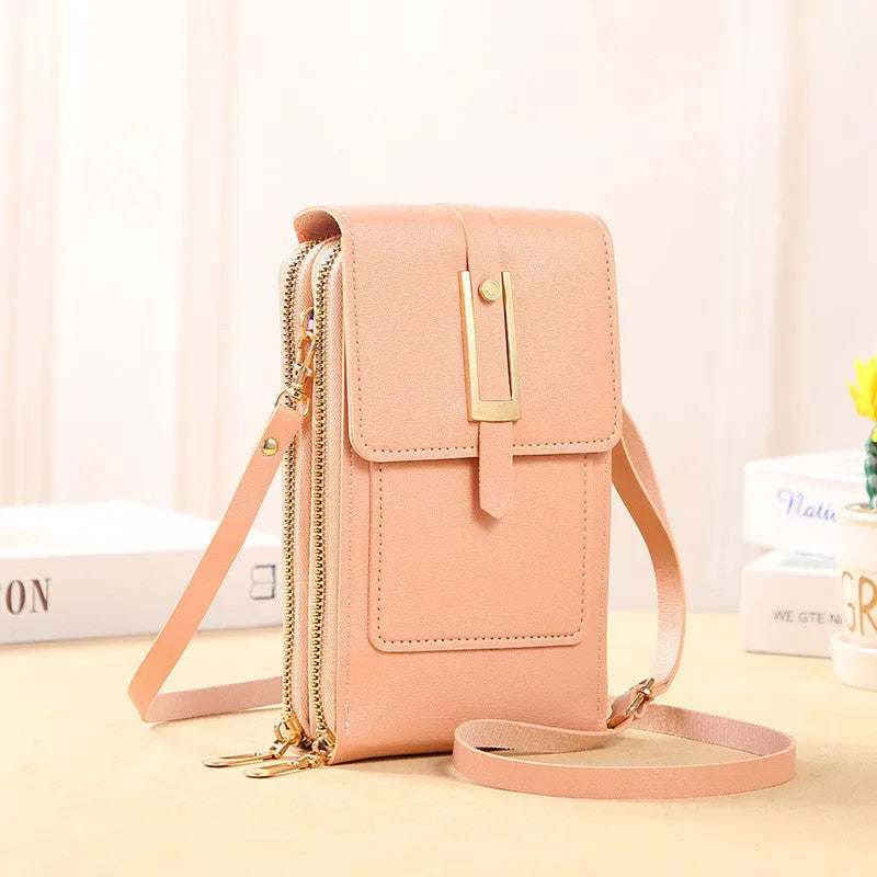 Women's transparent crossbody shoulder bag in PU material with touch screen phone capability, available in multiple colours