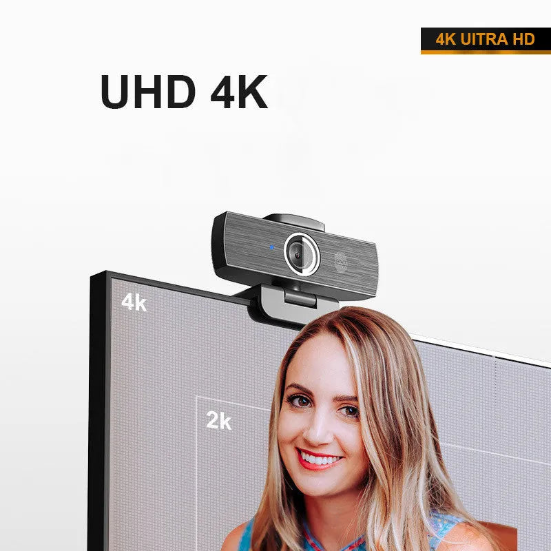 Black USB webcam with magnetic privacy cover showing 8MP 4K resolution and auto focus features