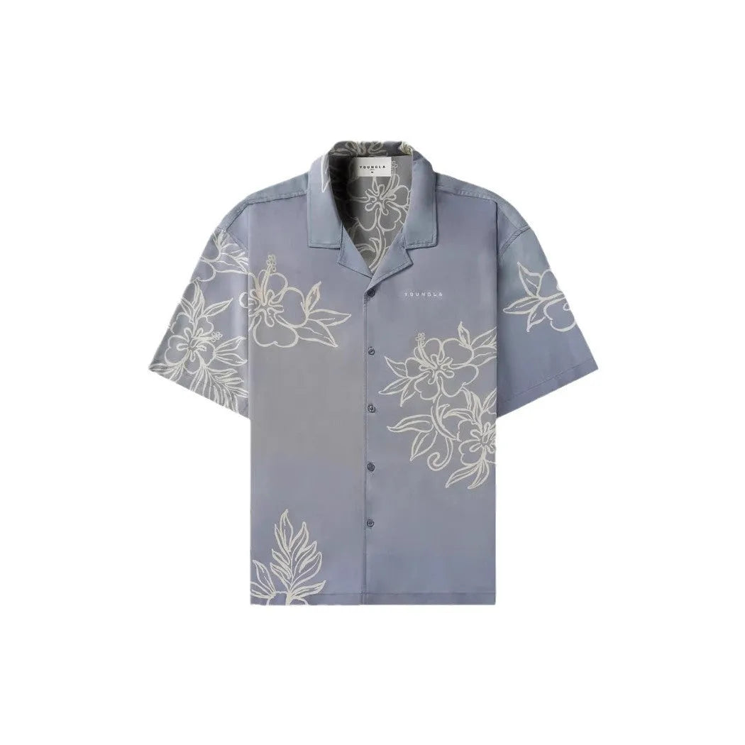 Man's loose-fitting short sleeve cardigan top with a floral print in light colours.