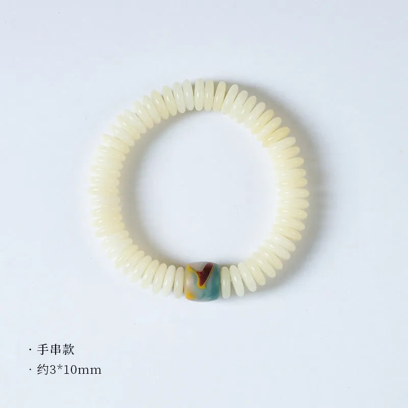 White Bodhi bead bracelet with 3 × 10mm beads in Tibetan style
