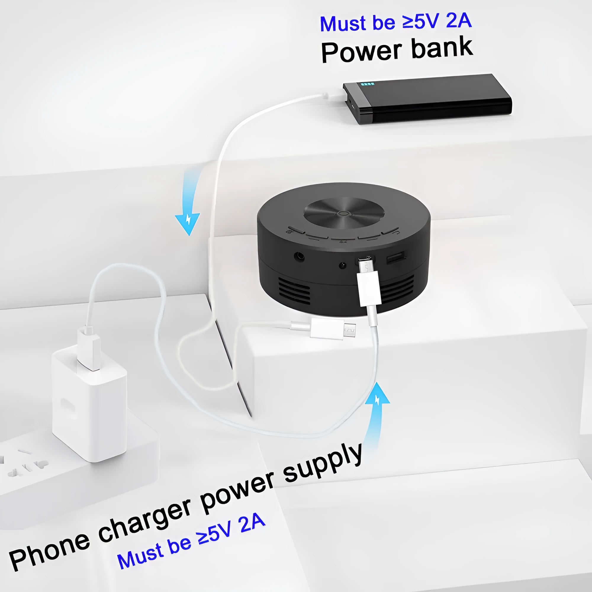 Black mini portable children's projector for mobile phone connection.