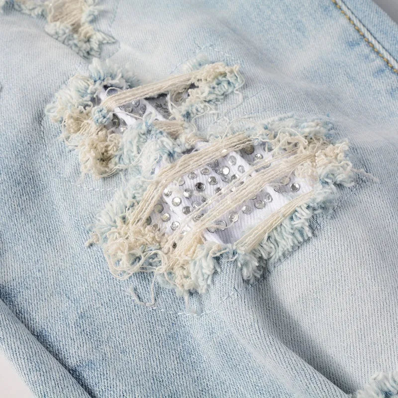 Light blue slim fit stretch jeans for men with hot diamond patch and cat-whisker details