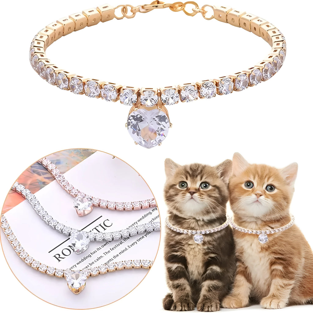 Shiny rhinestone heart-shaped collar for dog or cat in gold, on a size chart showing S, M, L measurements.