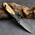 Folding camping knife with sandalwood handle, open 9cm stainless steel blade showing Laser Damascus pattern