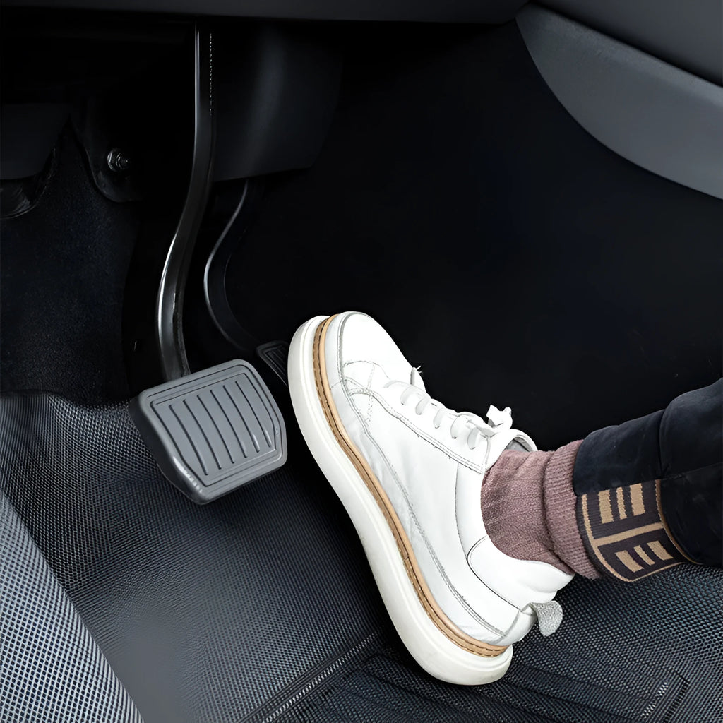 Custom TPR floor mat set for Tesla Model Y showing footwell, storage box, and tailbox mats.