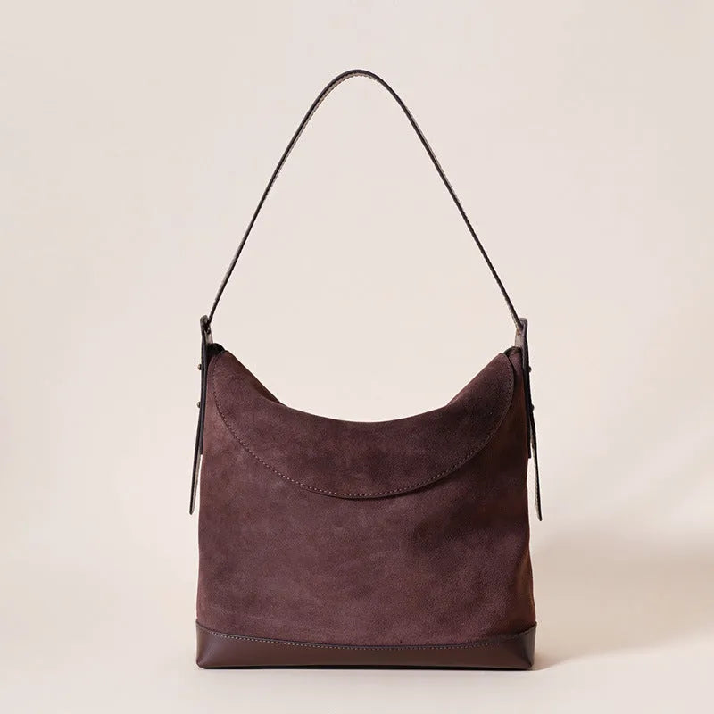 Light brown genuine leather retro style women's shoulder bag with clamshell opening.