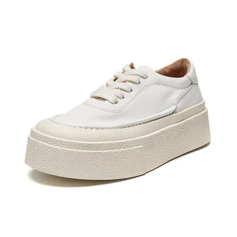 Women's black embossed cowhide platform sports board shoes with a rubber sole.