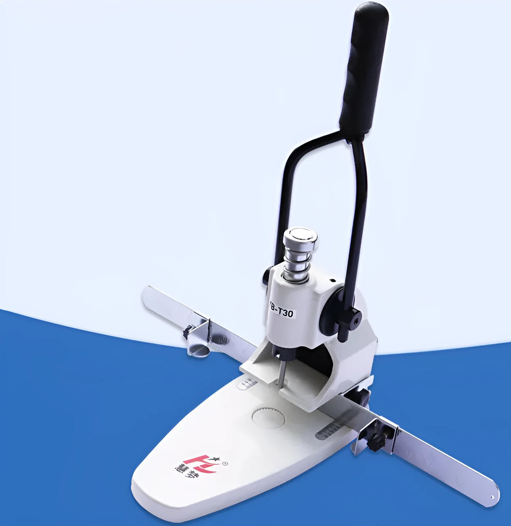 T30 single hole manual punching machine on a desk with paper stack inserted, adjustable edge guide visible