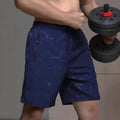 Men's loose fit sports shorts with printed patterns in polyester fabric available in black grey blue colours