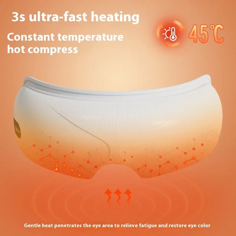 White rechargeable eye massager with airbag compression and hot compress functions on a plain background.