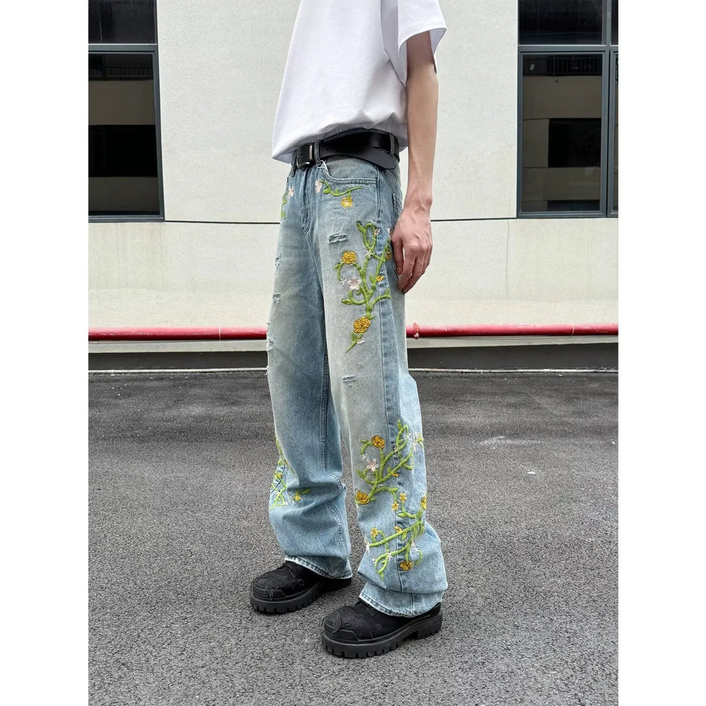 High street casual blue denim wide leg trousers with zip placket and mid-waist fit on model