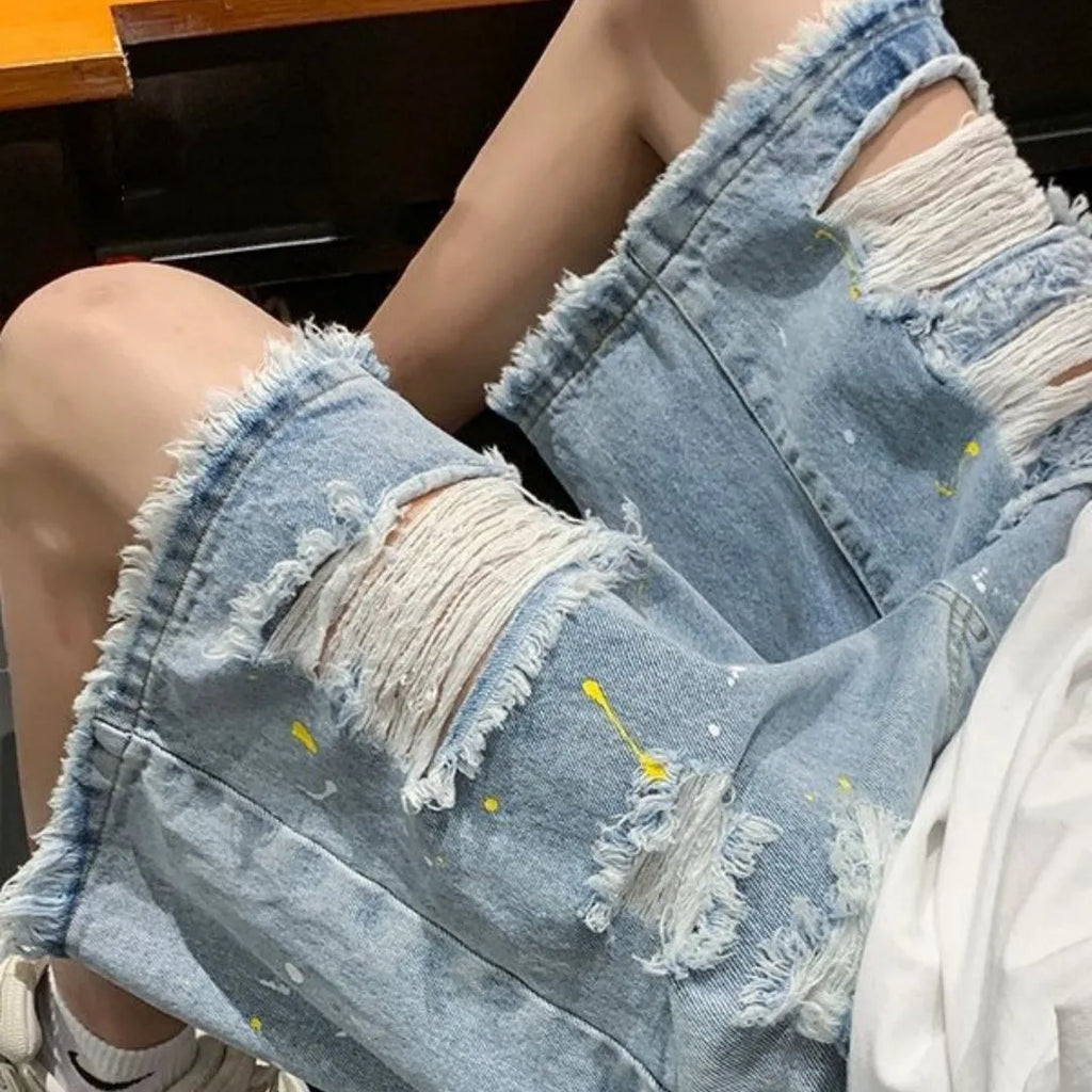 Men's loose fit water washed denim shorts with hole detailing in black and light blue colours