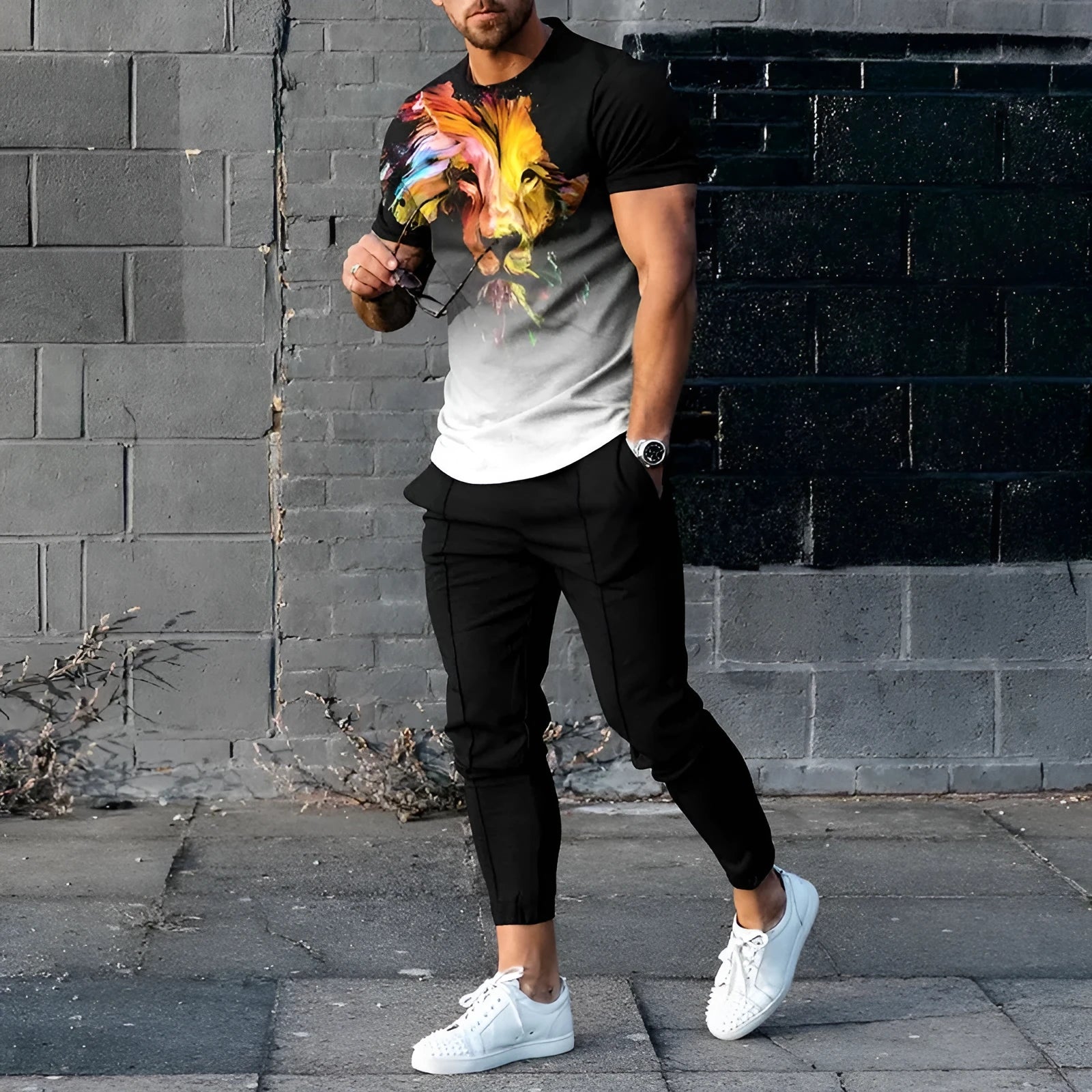 Men's grey polyester blend sport suit set with short sleeve T-shirt and matching trousers on a hanger.