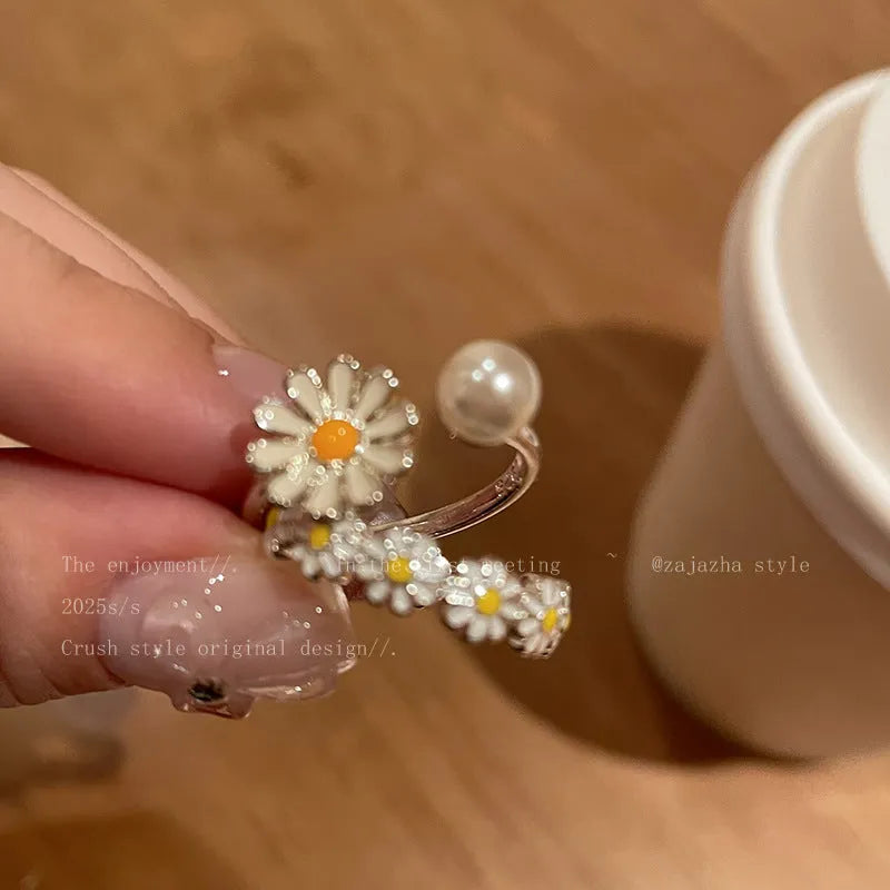 Women's copper opening ring with electroplated finish in daisy pearl and plain styles