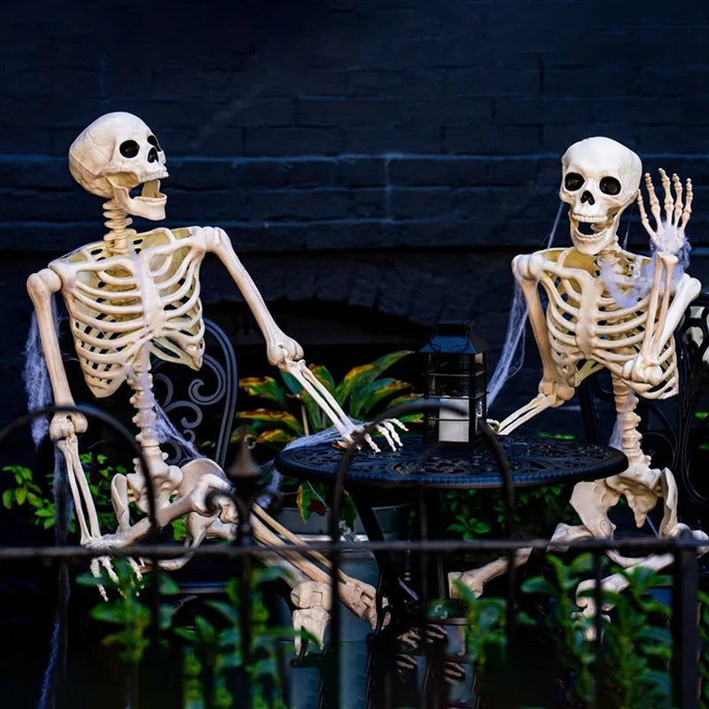 90cm tall white plastic Halloween skeleton with movable joints posed standing.