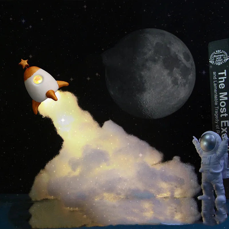 DIY astronaut rocket LED night light kit components including model, straws, chassis, and string lights for assembly