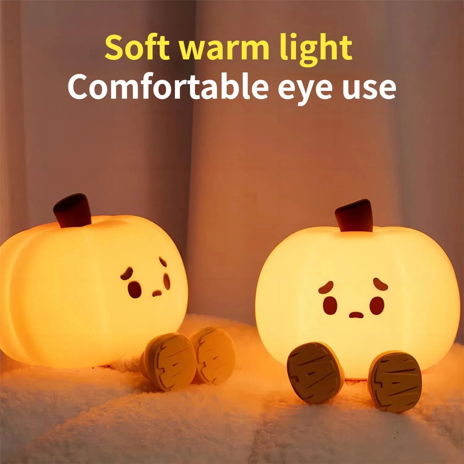 Orange pumpkin silicone night light with soft glowing illumination and touch controls