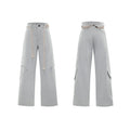Man's dark blue straight-leg cotton trousers with belt stitching and zipper details on a loose fit.