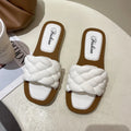 Women's PVC plaid beach sandals with a thick non-slip sole in black, green, orange, and white colour options.