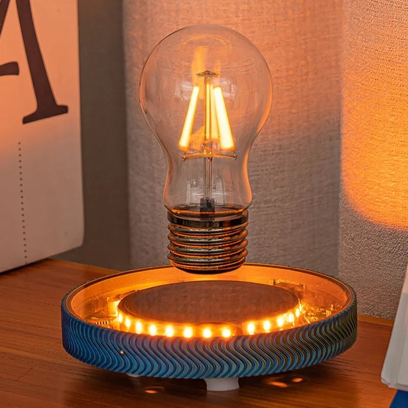 Modern magnetic suspension decorative lamp in 3D printed moon, Saturn or bulb design with cool white LED light.