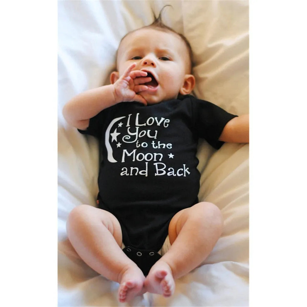 Baby boys black polyester romper with moon, star and letter print, short sleeves, triangle climbing style