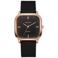 Women's rose gold square dial quartz watch with plastic strap on white background