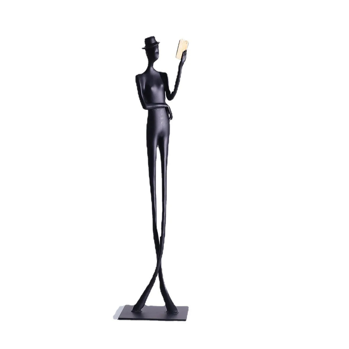 Black cast aluminium desktop sculpture of reading woman measuring 51 cm tall