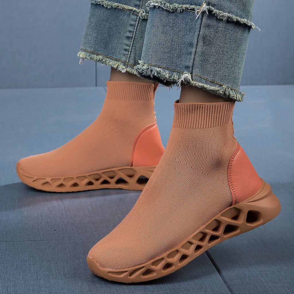 Women's black breathable mesh high-top casual sock boots with flat MD sole on a white background.