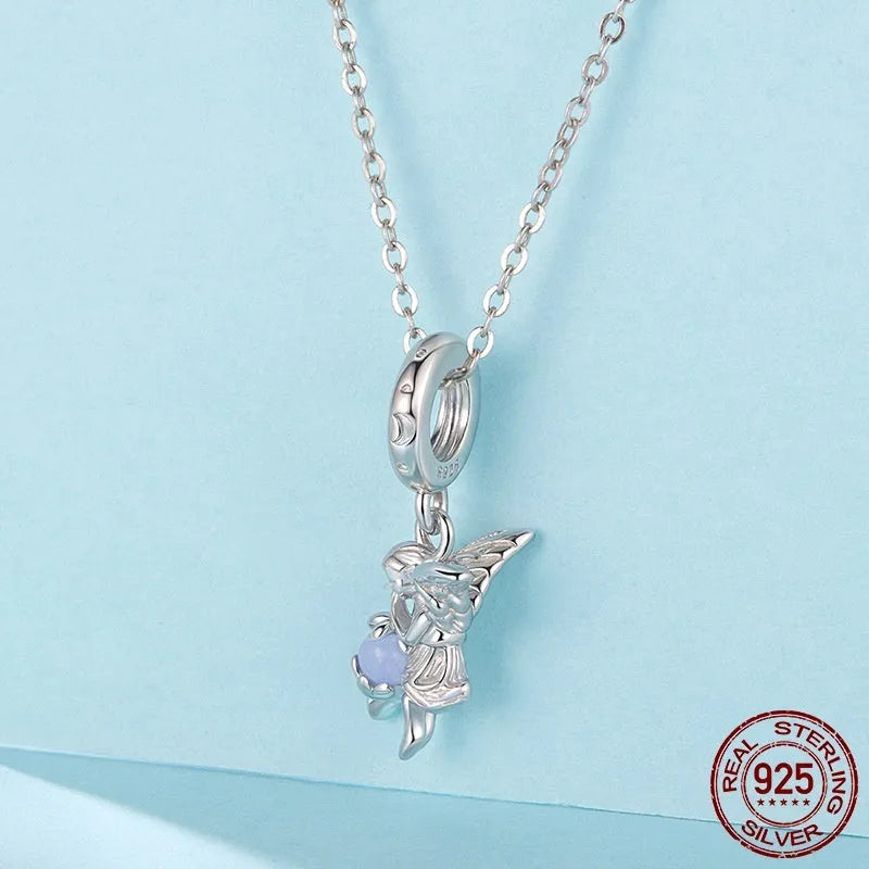 S925 sterling silver luminous angel pendant bead on a white background, showing 2.2cm height and 0.45cm aperture