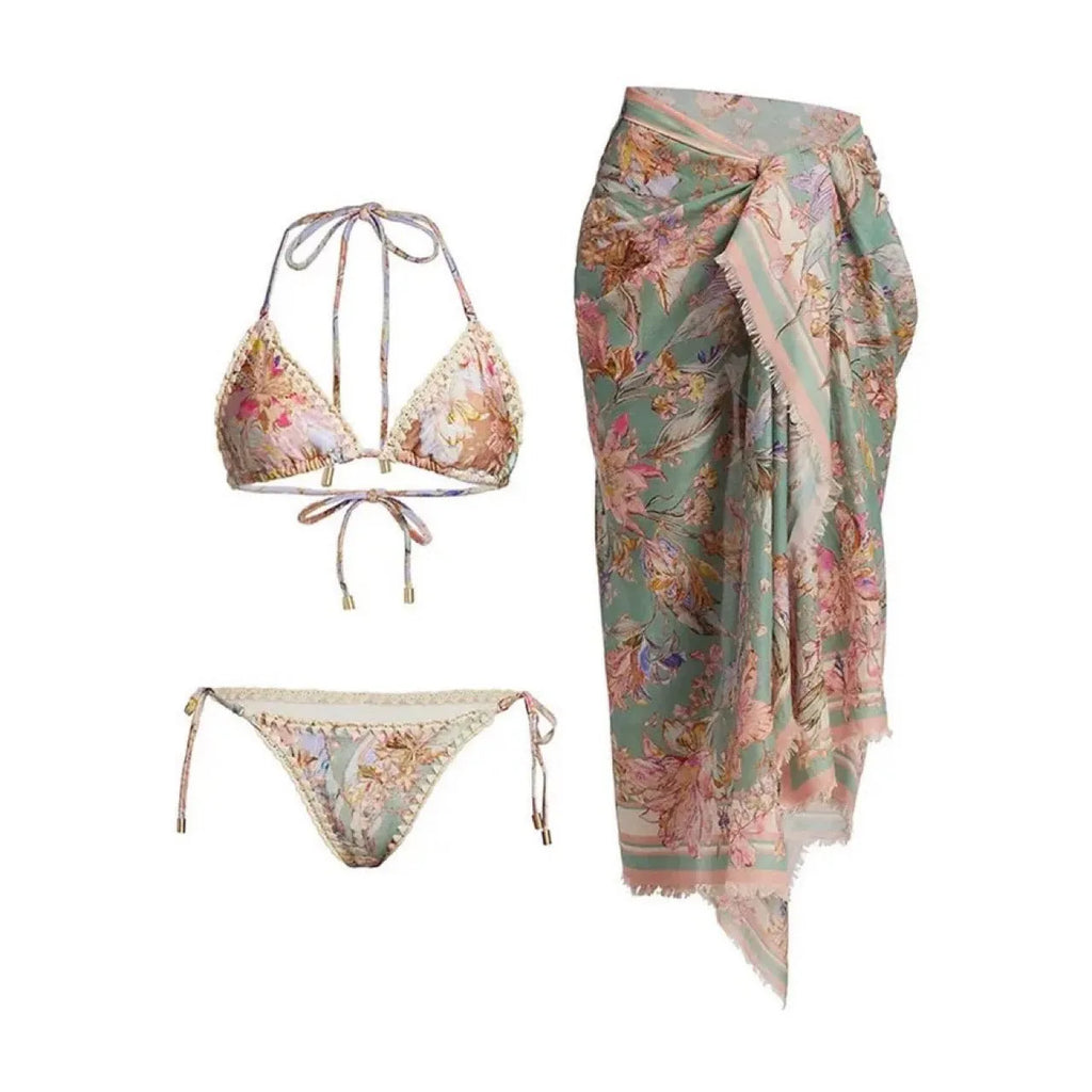 Women's creamy-white floral bikini set with matching skirt bottom