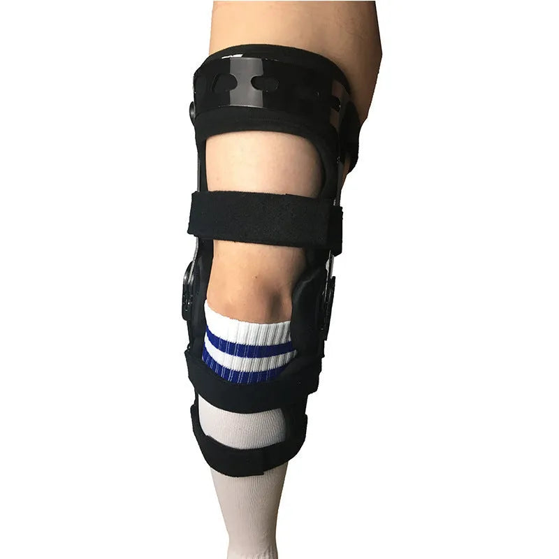 Black anterior ligament knee pad with reinforced straps shown in various size options