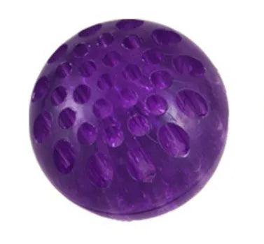 Blue solid honeycomb TPR pet toy ball with luminous flash on a white background