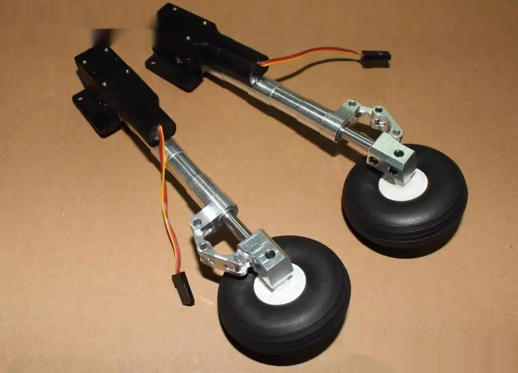 Retractable alloy shock-absorbing landing gear for electric aircraft models with choice of wheel sizes.