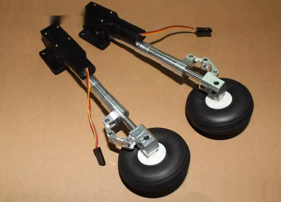 Retractable alloy shock-absorbing landing gear for electric aircraft models with choice of wheel sizes.