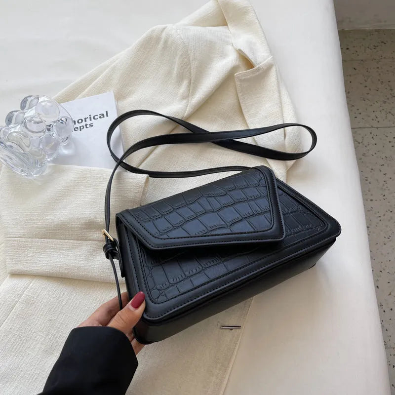 Stone pattern square shoulder bag in PU material showing horizontal suitcase shape with one-shoulder strap