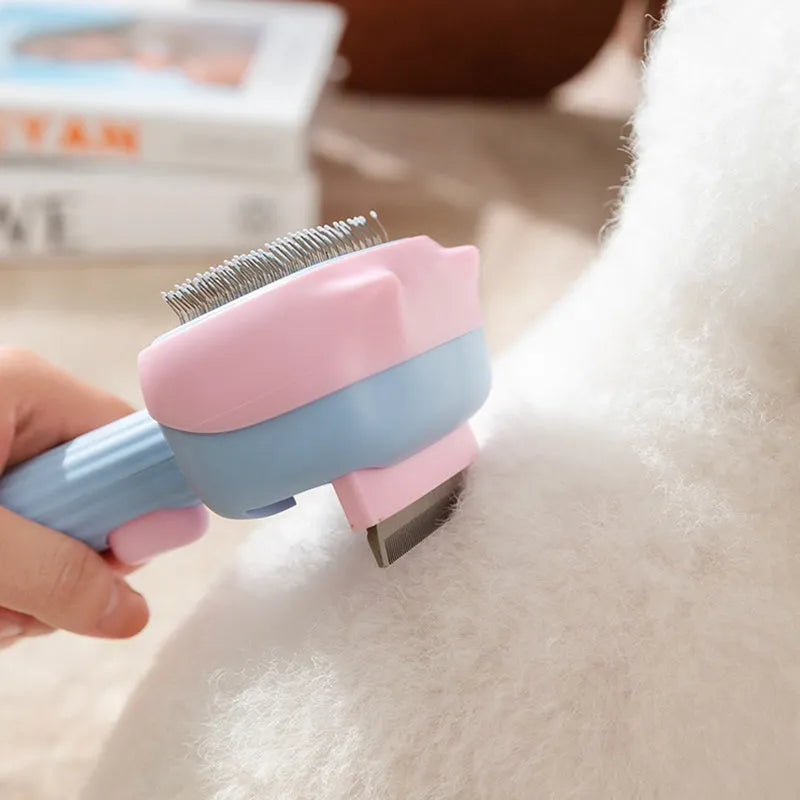 Blue and green double-sided pet grooming brush with dematting comb and undercoat rake on a 195mm handle.