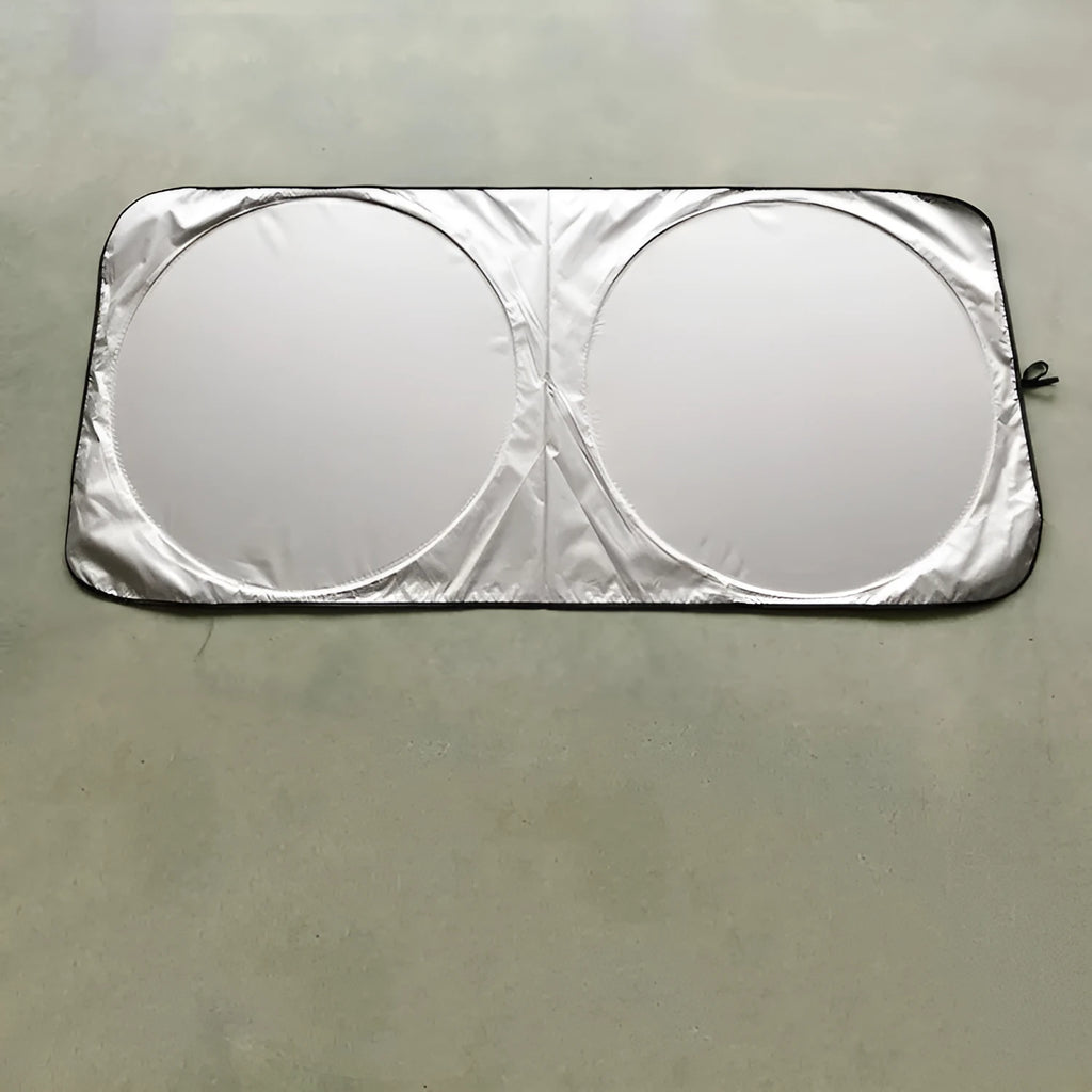 Silver tape car sunshade folded beside 190*90 cloth storage bag showing 190x90cm dimensions