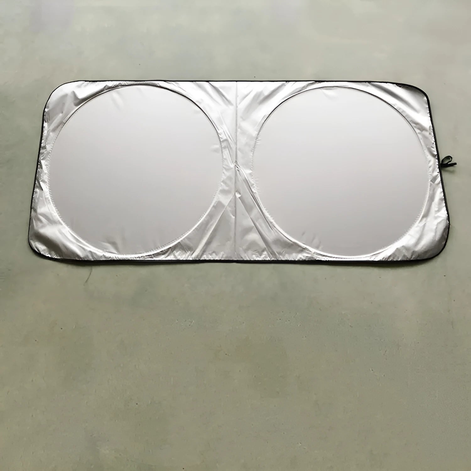 Silver tape car sunshade folded beside 190*90 cloth storage bag showing 190x90cm dimensions