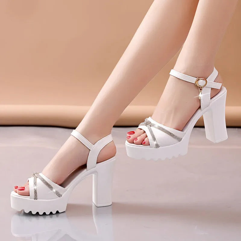 Women's black and white high heel sandals in PU material available in sizes 35 to 42