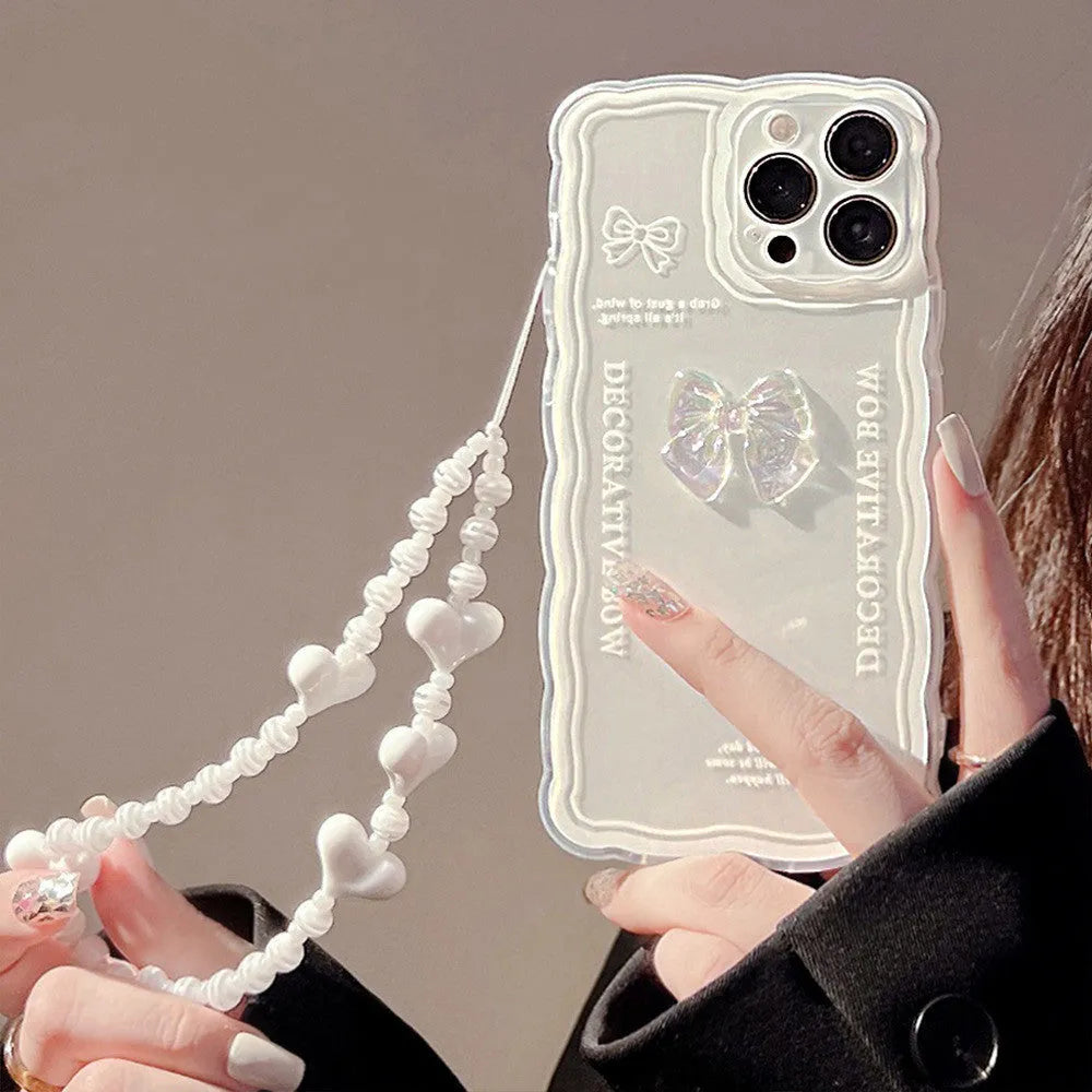 Transparent iPhone case with ice crystal bow design and white lanyard for multiple iPhone models