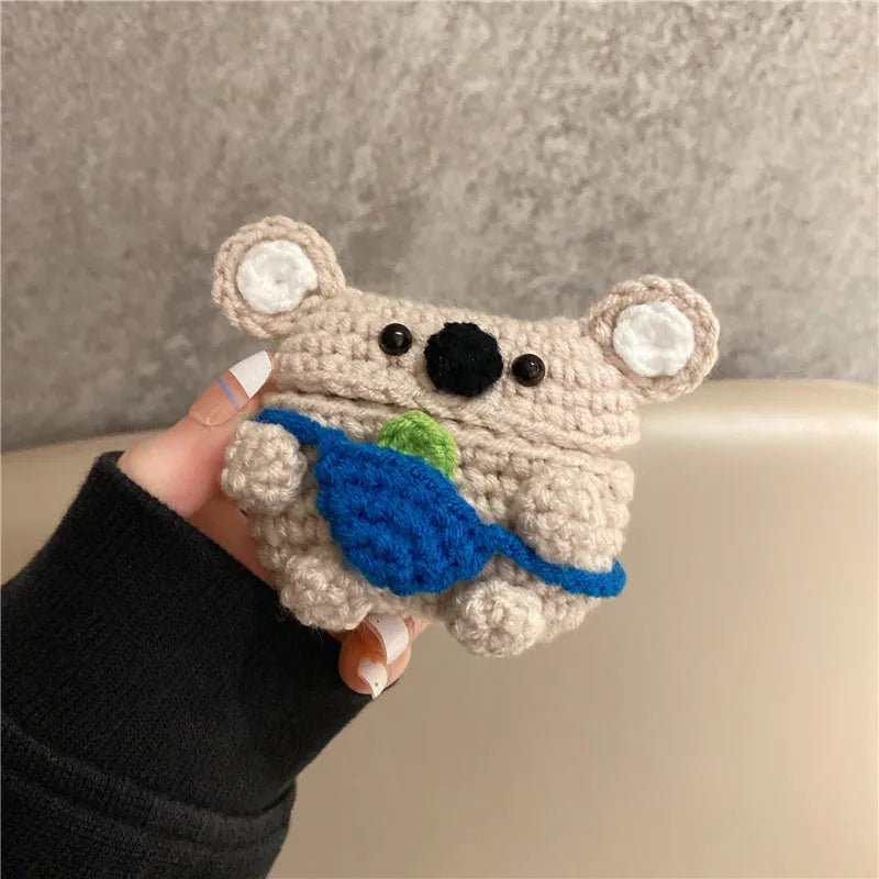 Hand-knitted koala bear backpack design protective cover for Apple AirPods charging case.