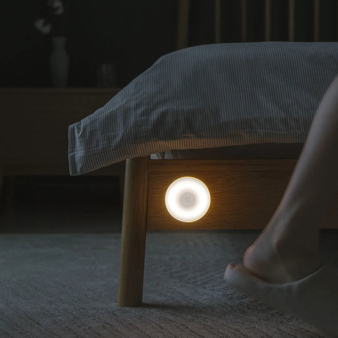 White Mijia Night Light 2 Bluetooth bedside lamp with human body induction sensor.