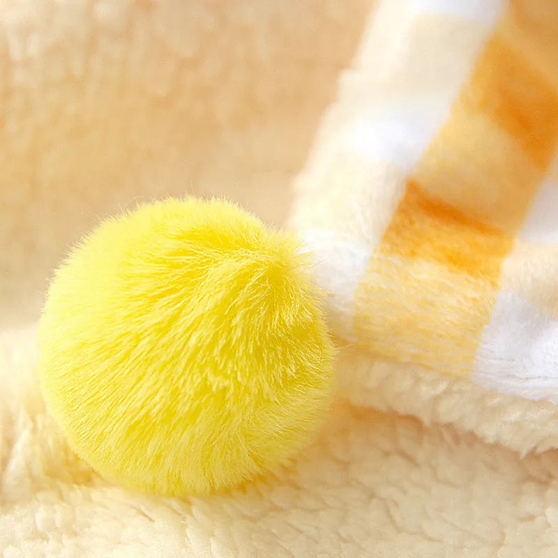 Blue coral fleece pet blanket shown in a large size on a wooden floor