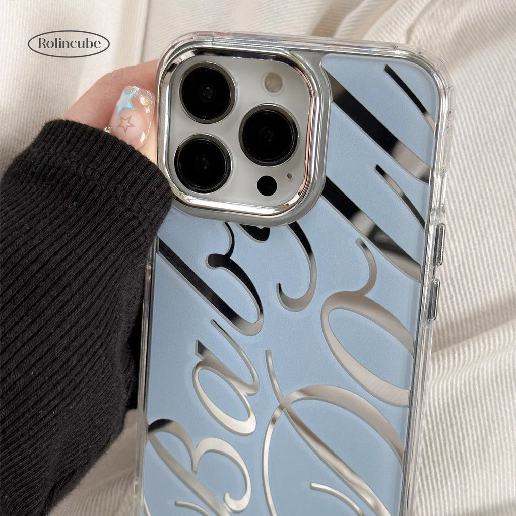 Blue transparent iPhone case with mirror accents and JMKJ English letters, shown fitted to a phone.