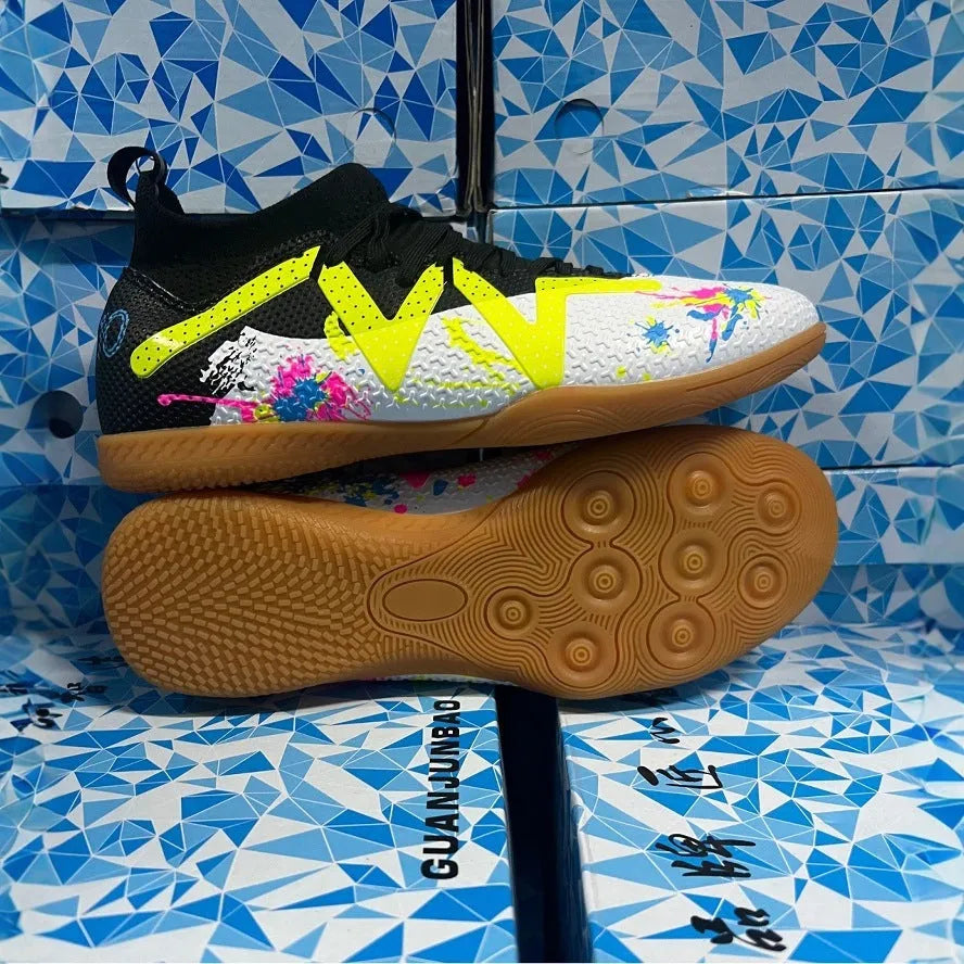 Low-top football boots with replaceable rubber studs on a non-slip sole, in Black and Yellow colourway.