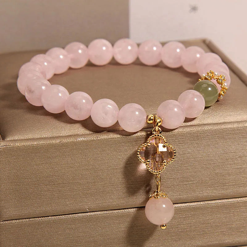 Pink crystal four-leaf clover pendant women's bracelet with alloy inlay and rhinestone details