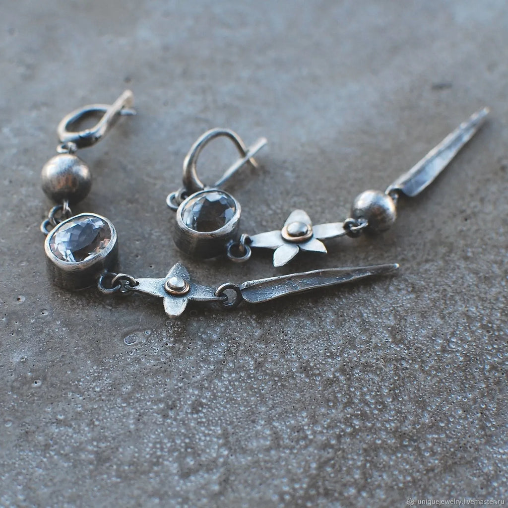 Geometric antique silver plated long pendant earrings with XINGX design and rhinestone detailing