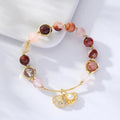 Women's crystal bracelet with colourful shell or red flower design and animal/Zodiac cartoon modelling.